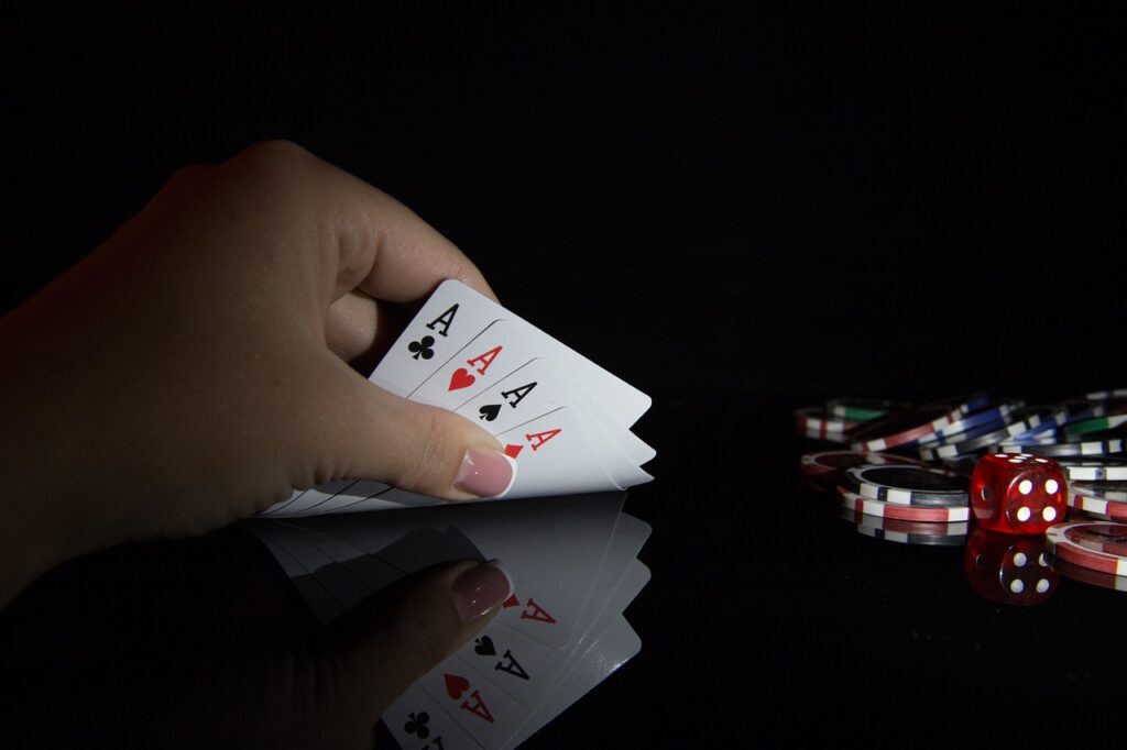 Tela do jogo Wild Bandito mostrando giros, multiplicadores e símbolos vibrantes em uma cidade mexicana iluminada.